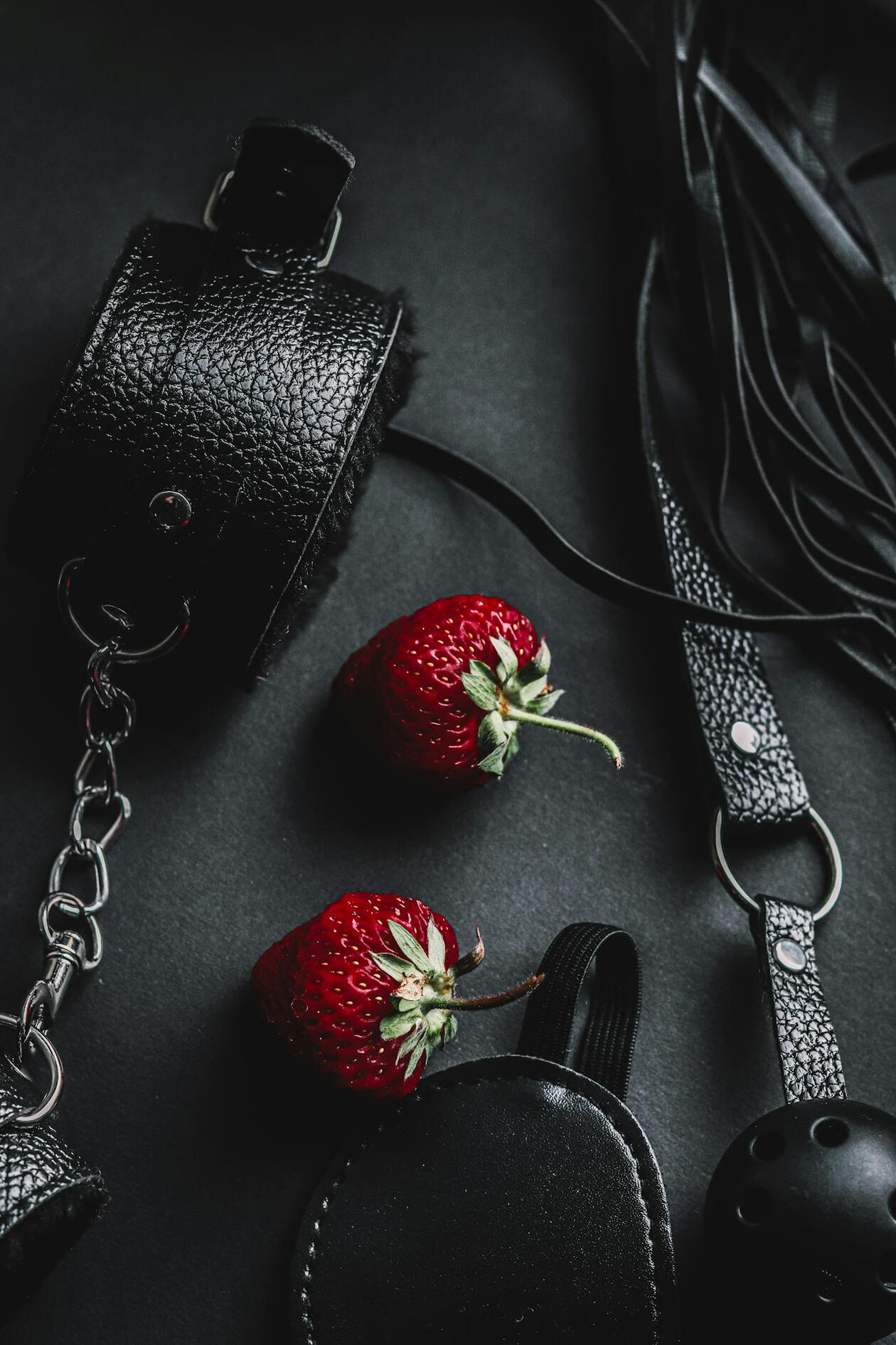 strawberries, cuffs, and gags